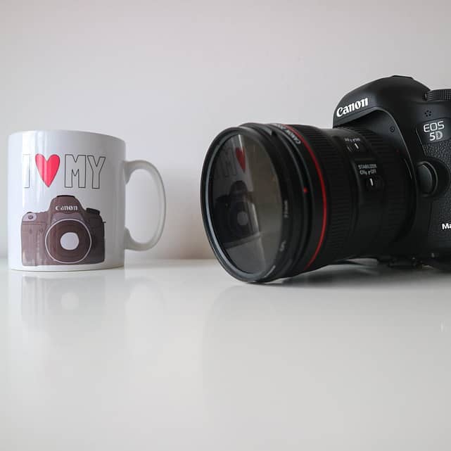 Catherine Tuckwell Brand photography white coffee mug with Canon SLR camera
